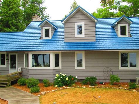 metal roof on blue house|blue corrugated roofing.